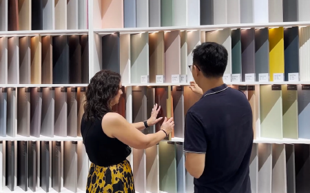 Clients selecting custom material samples and finishes with a George Casa design consultant.