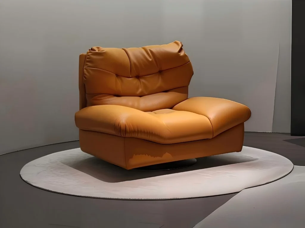 Contemporary orange leather swivel lounge chair with detailed stitching.