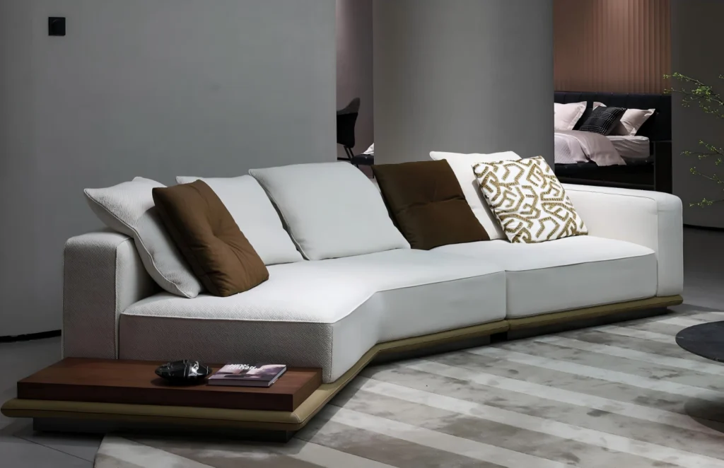 White curved lounge sofa perfect for bespoke residential interior projects.
