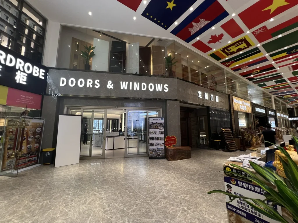The main entrance of George Homes one-stop building materials showroom in Foshan China, featuring specialized zones for custom doors, windows, and wardrobes.